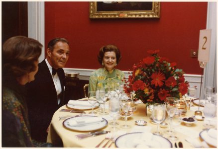 Photograph of First Lady Betty Ford Dining with Alexander Haig and an Unidentified Woman in the Red Room of the White... - NARA - 186781