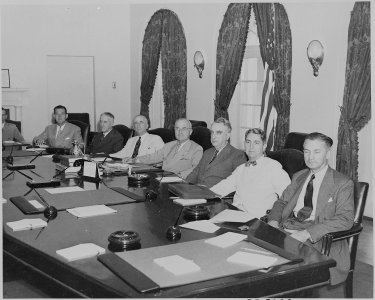 Photograph of officials at Cabinet meeting, (from left to right) Fortas (partially obscured), Hannegan, Stimson... - NARA - 199153
