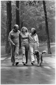 Photograph of President Gerald Ford and First Lady Betty Ford Walking with Their Daughter Susan and Their Dog... - NARA - 186835 photo
