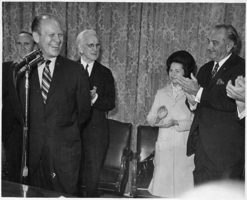 Photograph of President and Mrs. Lyndon Baines Johnson and Others Saluting House Minority Leader Gerald R. Ford in... - NARA - 186981