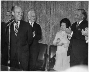 Photograph of President and Mrs. Lyndon Baines Johnson and Others Saluting House Minority Leader Gerald R. Ford in... - NARA - 186981