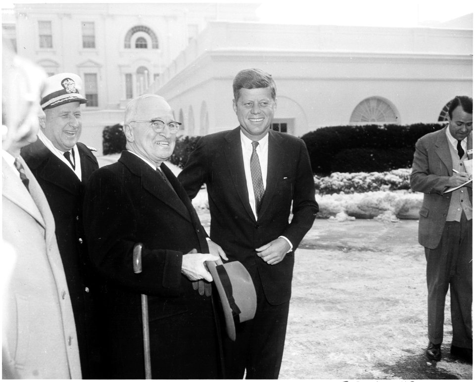 Photograph of President John F. Kennedy, on his first full day in office, greeting former President Harry S. Truman... - NARA - 200436