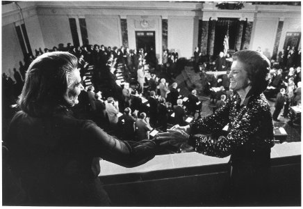Photograph of First Lady Betty Ford Congratulating Happy Rockefeller Following the Swearing-In of Nelson A.... - NARA - 186786 photo