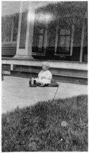 Photograph of Gerald R. Ford, Jr., Playing on the Front Walk of his Home in Grand Rapids, Michigan - NARA - 186937 photo