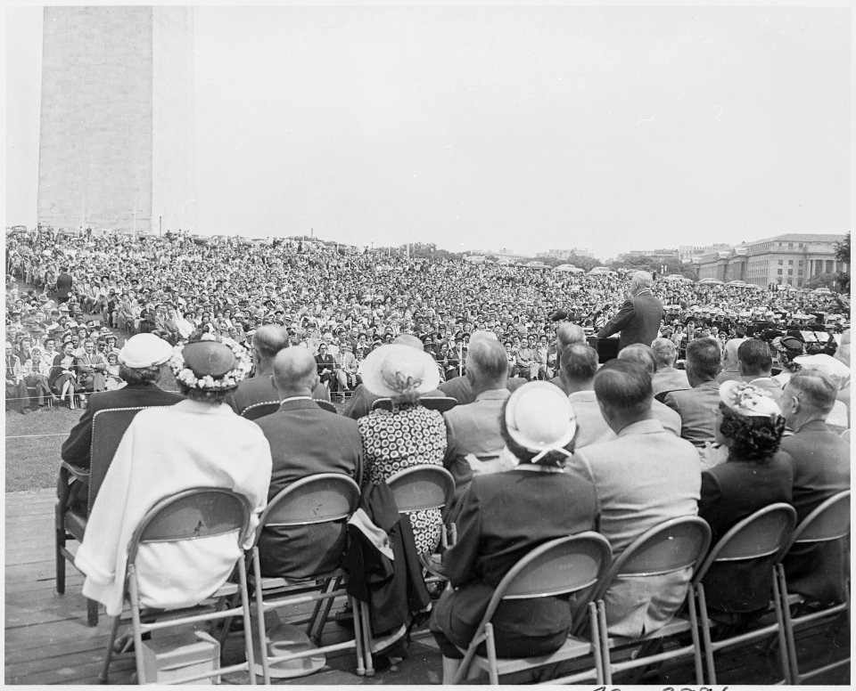 Photograph of President Truman addressing a large crowd at the Sylvan Theatre on the Washington Monument grounds... - NARA - 200384