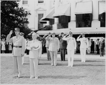 Photograph of President Truman and French President Charles de Gaulle, during welcoming ceremonies on the White House... - NARA - 199185 photo