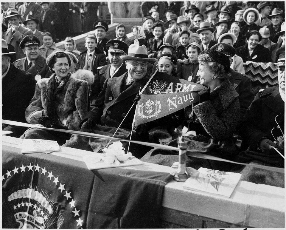 Photograph of President Truman and his daughter Margaret with other spectators at the annual Army-Navy football game... - NARA - 200399