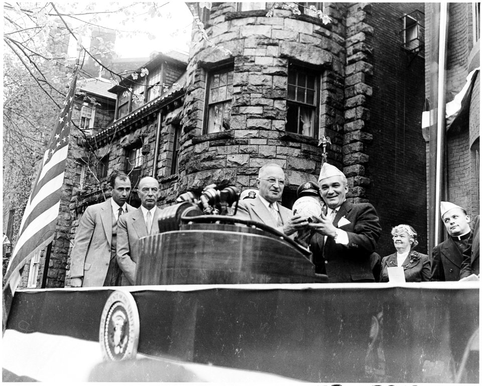 Photograph of President Truman and other dignitaries at the dedication of the new AMVETS headquarters in Washington. - NARA - 200365