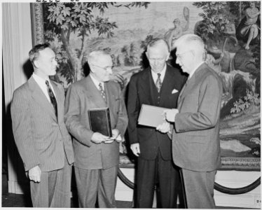 Photograph of President Truman and former Secretary of State George C. Marshall at the Library of Congress, on the... - NARA - 200195