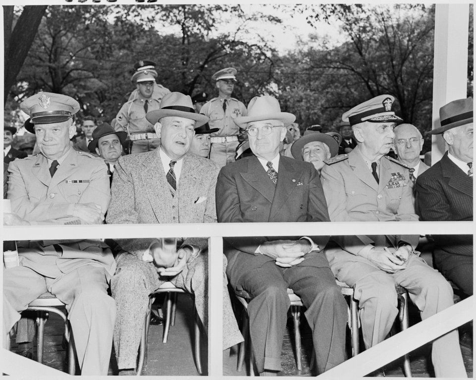 Photograph of President Truman and other dignitaries on the reviewing stand during an Armed Forces Day parade, (left... - NARA - 200222