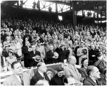 Photograph of President Truman and other dignitaries saluting the flag at Griffith Stadium in Washington, prior to... - NARA - 200366