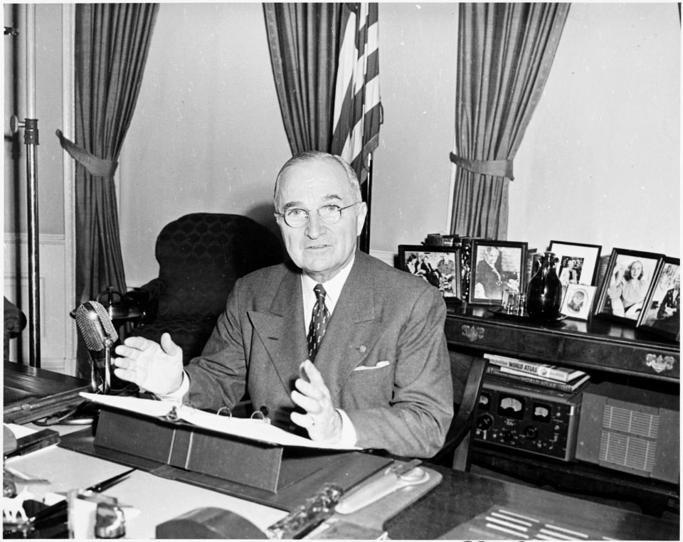Photograph of President Truman at his desk in the Oval Office on the occasion of his speech to the nation on... - NARA - 200355