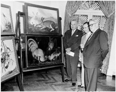 Photograph of President Truman at the White House accepting ten paintings by John J. Audubon, a gift to the United... - NARA - 200330