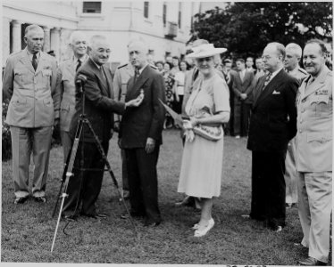 Photograph of President Truman awarding the Distinguished Service Medal to Secretary of State James Byrnes in the... - NARA - 199181