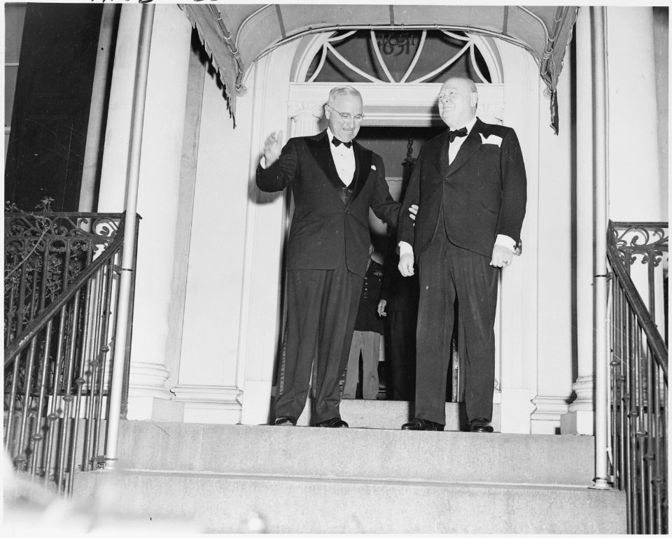 Photograph of President Truman and Winston Churchill outside Blair House in Washington, during Churchill's visit to... - NARA - 200110