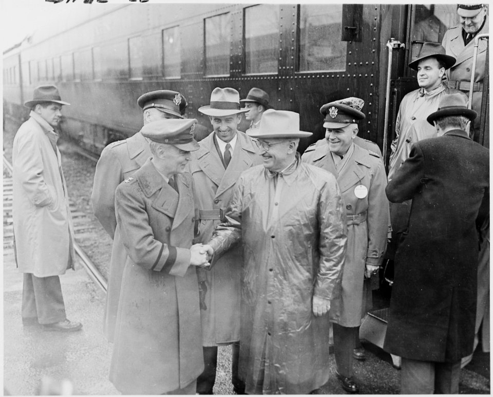 Photograph of President Truman being greeted by officers upon his arrival at Aberdeen Proving Ground in Maryland, for... - NARA - 200280