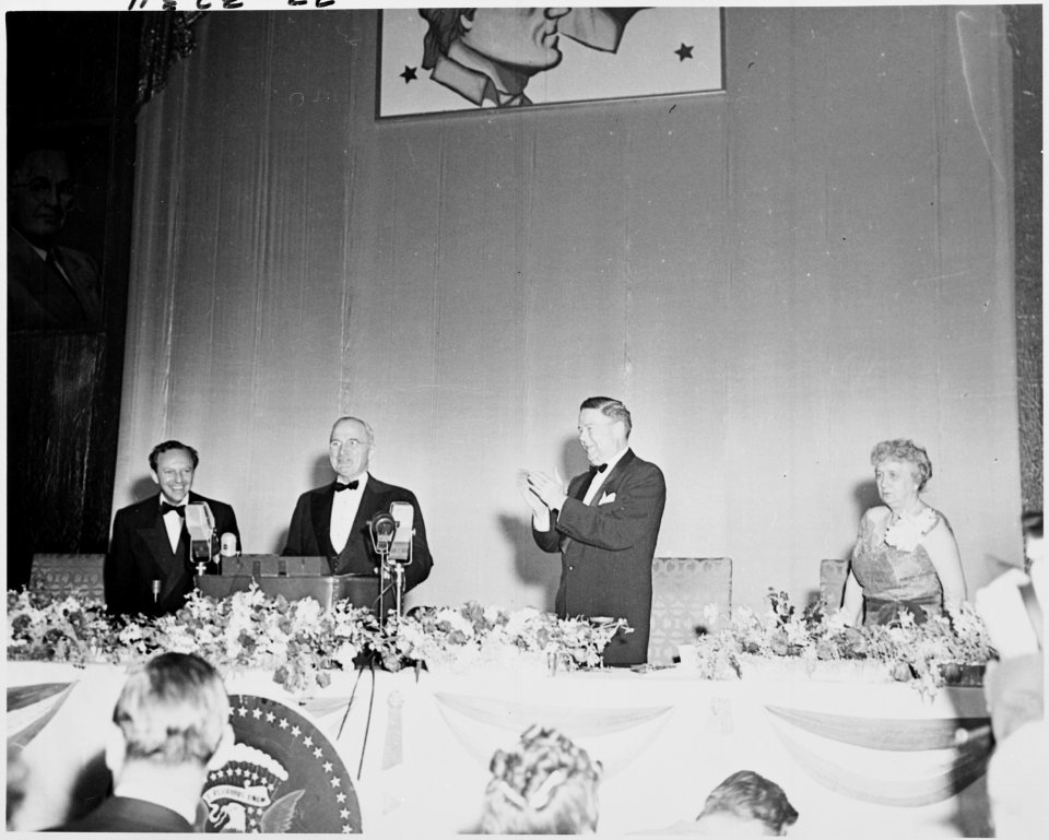 Photograph of President Truman at the podium, receiving applause during the Jefferson-Jackson Day Dinner at... - NARA - 200179