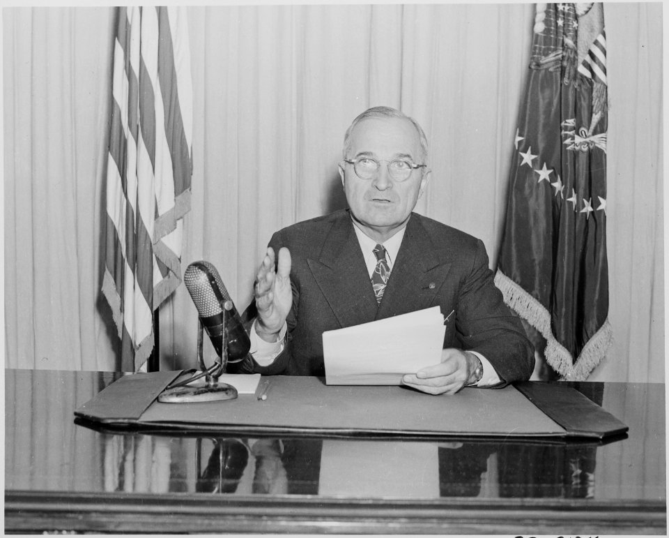 Photograph of President Truman delivering a radio speech to the nation on the status of his program for reconversion... - NARA - 199289
