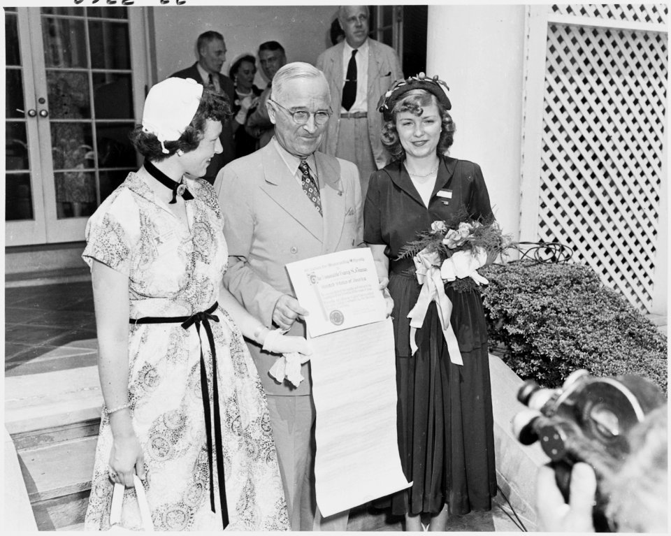 Photograph of President Truman outside the White House receiving a certificate from representatives of Girls Nation... - NARA - 200226