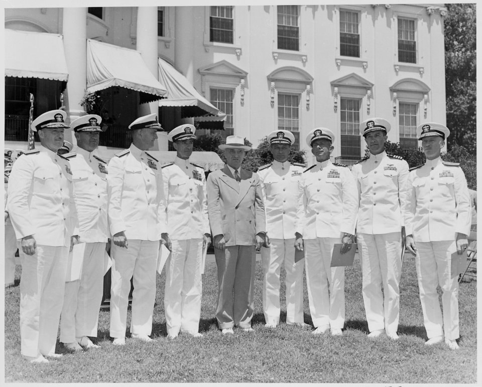 Photograph of President Truman posing on the White House lawn with officers from eight U.S. Navy aircraft carriers... - NARA - 199399