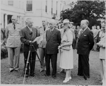 Photograph of President Truman reading the citation for Secretary Byrnes's Distinguished Service Medal, (from left to... - NARA - 199183