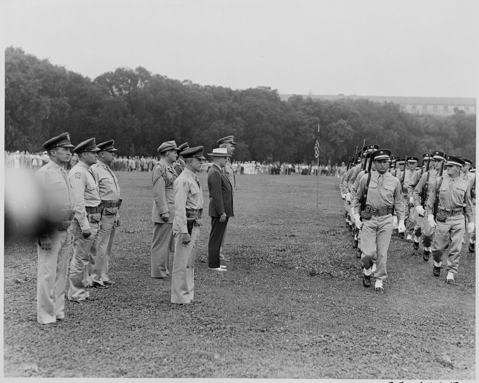 Photograph of President Truman reviewing the military police of the District of Columbia on the Ellipse. - NARA - 199380