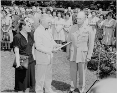 Photograph of President Truman reading the citation for General Dwight D. Eisenhower's Distinguished Service Medal... - NARA - 199130