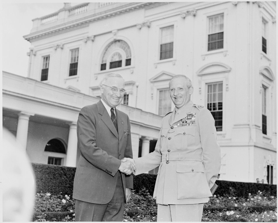 Photograph of President Truman shaking hands with Field Marshal Bernard Montgomery on the White House lawn. - NARA - 199428