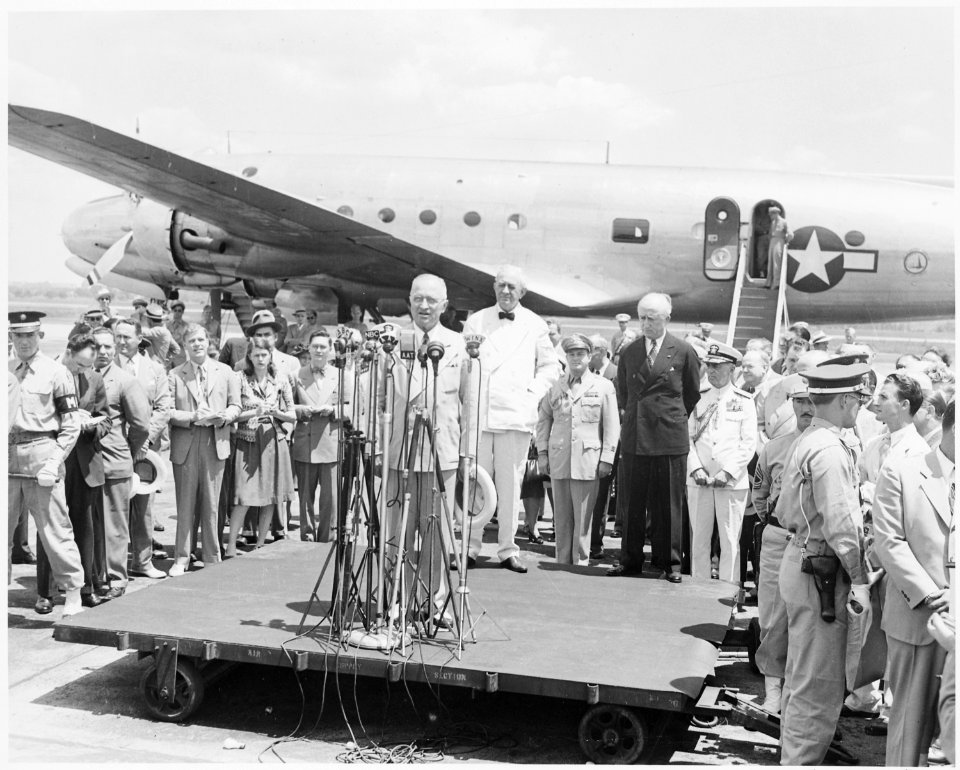 Photograph of President Truman speaking at the airport ceremony marking the departure of Secretary of State James... - NARA - 199412
