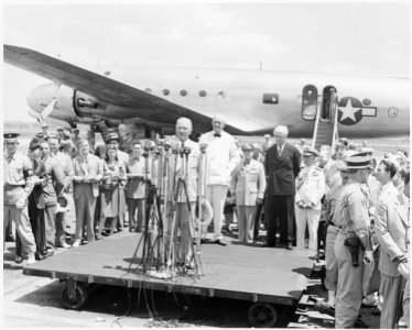 Photograph of President Truman speaking at the airport ceremony marking the departure of Secretary of State James... - NARA - 199412