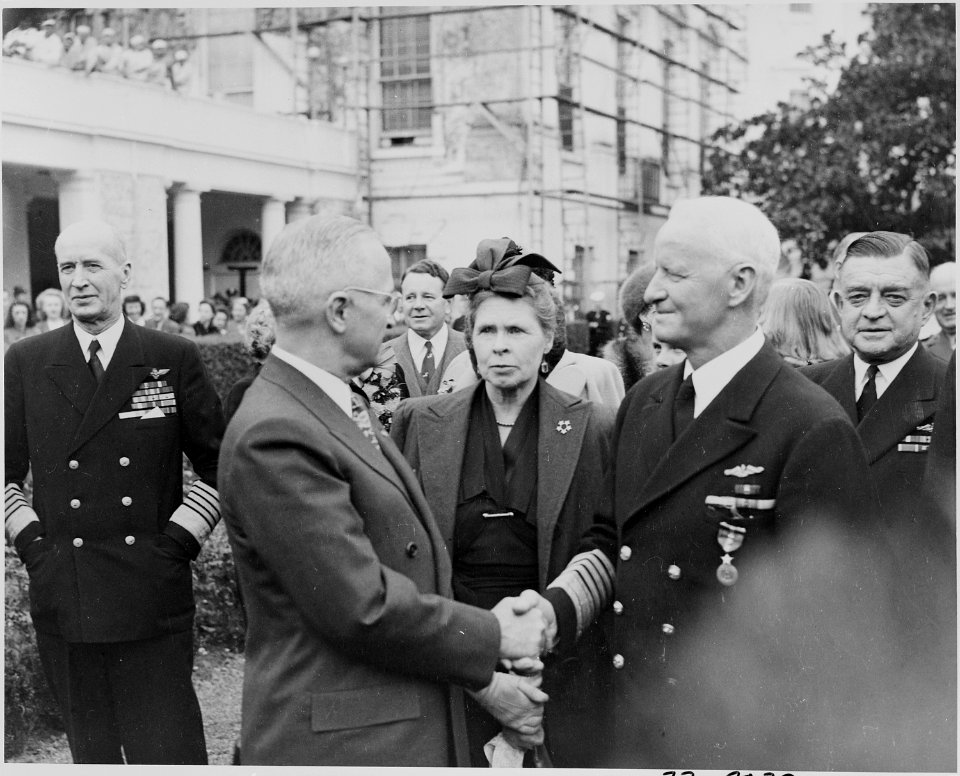 Photograph of President Truman shaking hands with Admiral Chester Nimitz after presenting him with a medal in the... - NARA - 199226