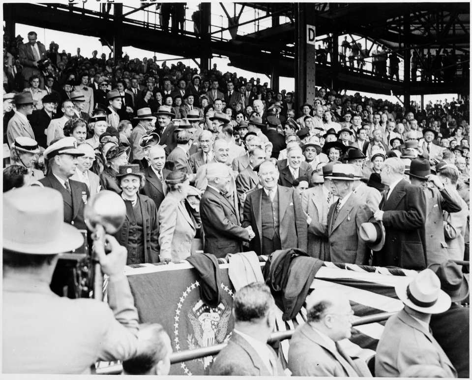 Photograph of President Truman shaking hands with Vice President Alben Barkley at Washington's Griffith Stadium, on... - NARA - 200201