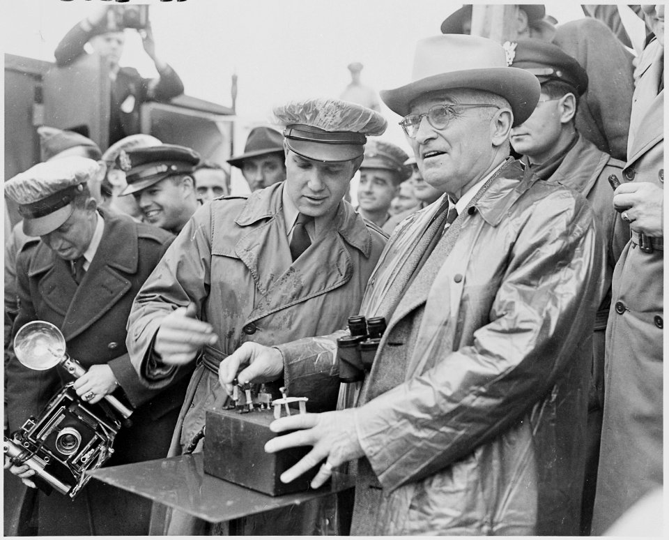 Photograph of President Truman throwing a switch during a demonstration of military hardware at Aberdeen Proving... - NARA - 200275