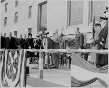 Photograph of President Truman speaking at a ceremony in the Pentagon Court honoring the retiring Army Chief of... - NARA - 199267