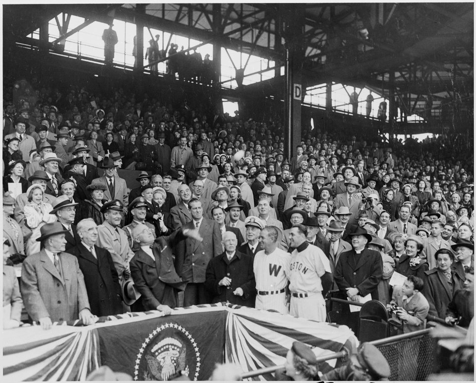 Photograph of President Truman throwing out the first ball to launch the 1952 baseball season, at Griffith Stadium in... - NARA - 200367