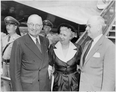 Photograph of President Truman with First Lady Bess Truman and Treasury Secretary John Snyder, at the airport in... - NARA - 200391