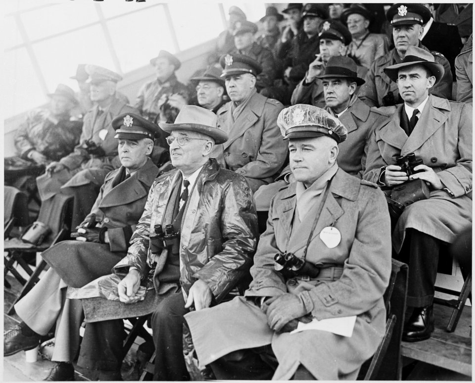 Photograph of President Truman watching a demonstration of military hardware with other dignitaries, at Aberdeen... - NARA - 200276