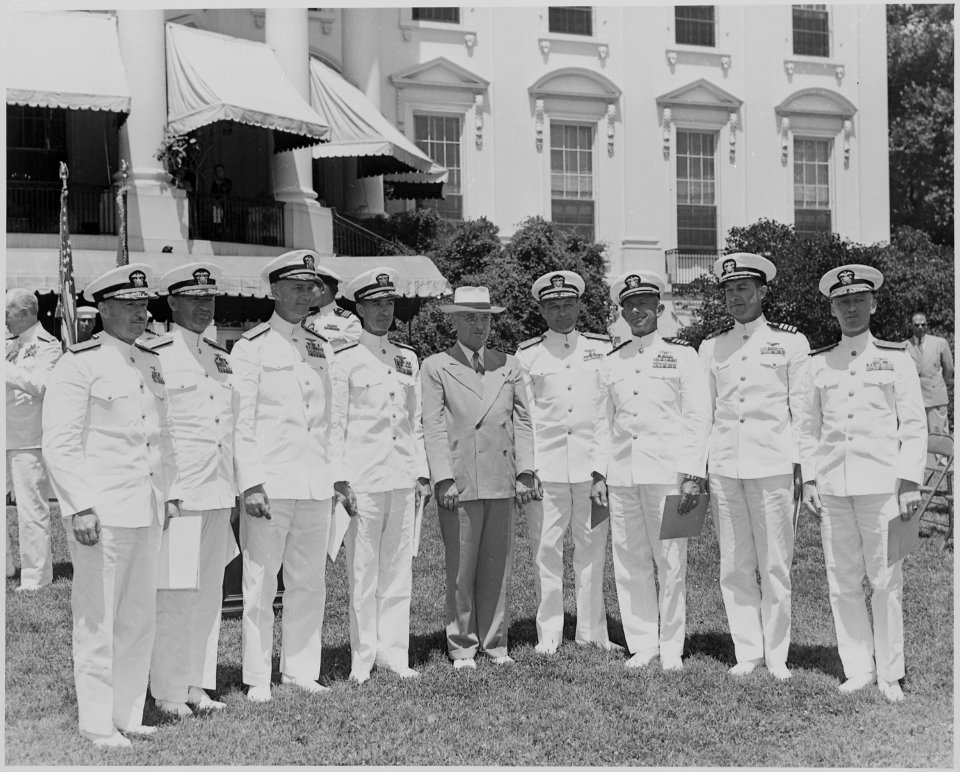 Photograph of President Truman with officers from eight U.S. Navy aircraft carriers receiving Presidential Unit... - NARA - 199398