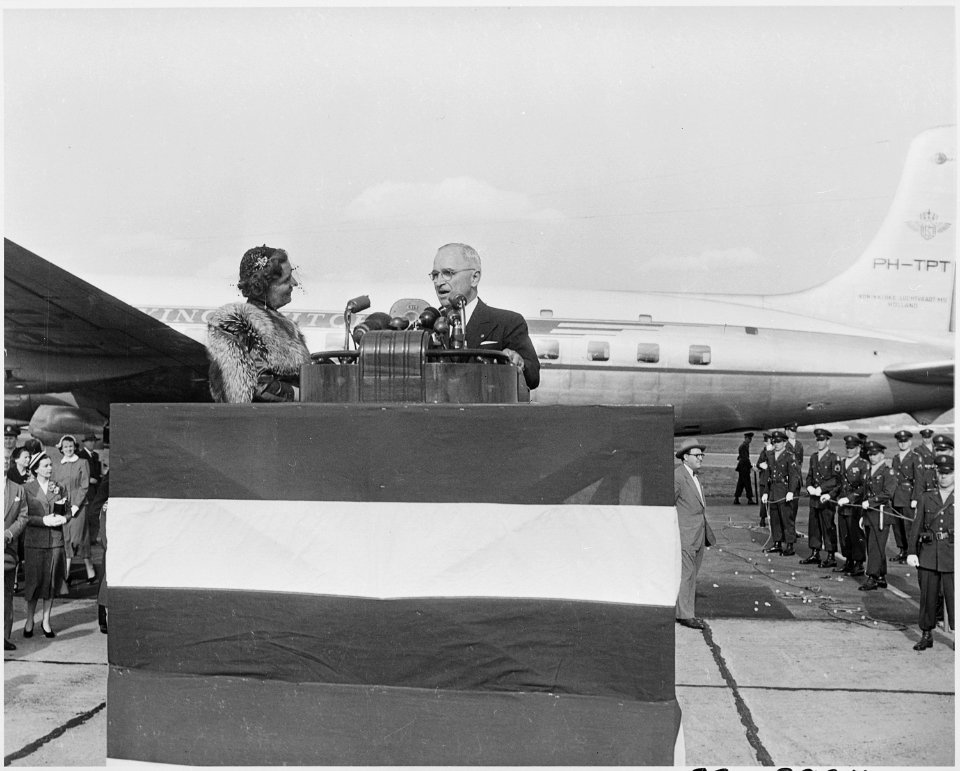Photograph of President Truman welcoming Queen Juliana of the Netherlands, at Washington National Airport. - NARA - 200373