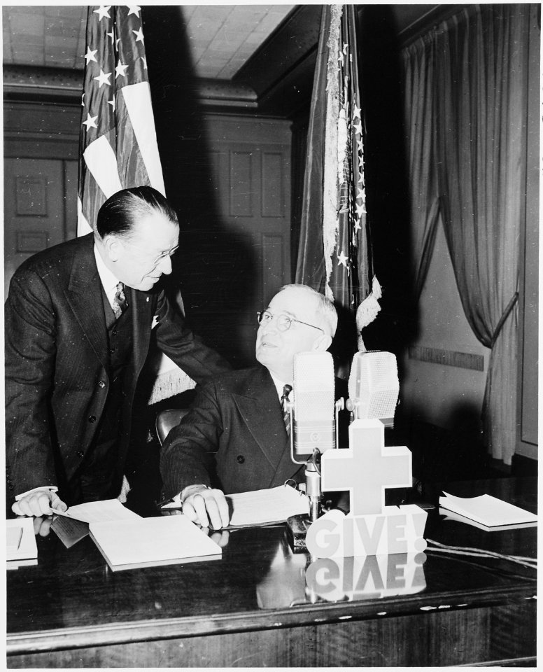 Photograph of President Truman with Basil O'Connor, chairman of the American Red Cross, during a radio broadcast in... - NARA - 200096