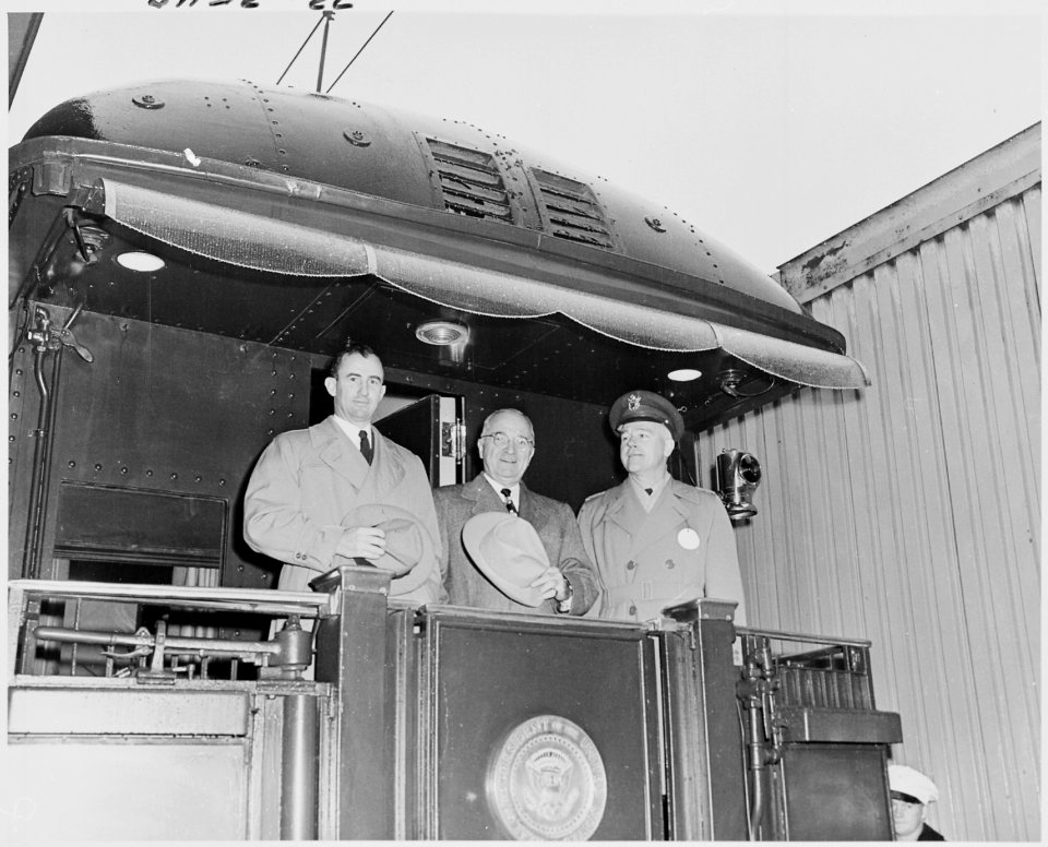 Photograph of President Truman with two other dignitaries on the rear platform of his railroad car, the Ferdinand... - NARA - 200281
