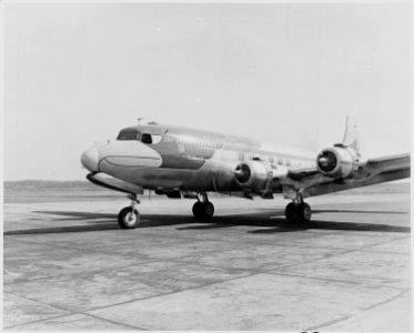 Photograph of President Truman's airplane, a DC-6 called The Independence, as it prepares to depart Washington... - NARA - 200294