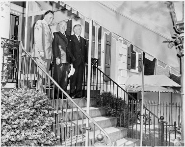 Photograph of President Truman, President Galo Plaza of Ecuador (left), and Vice President Alben Barkley, on the... - NARA - 200303 photo