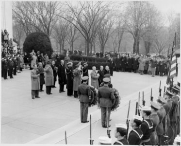 Photograph of President Truman, British Prime Minister Clement Attlee, and other dignitaries standing at attention... - NARA - 199252
