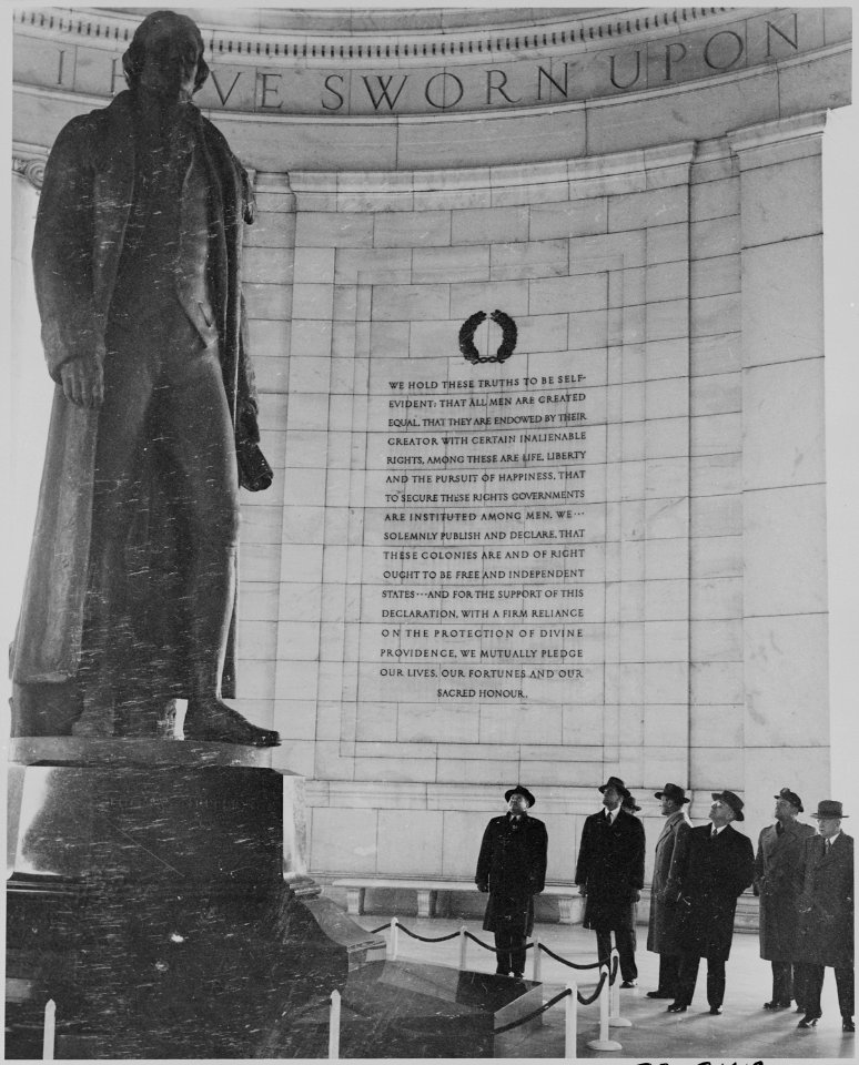 Photograph of President Truman with Secretary of the Interior Harold Ickes and others, standing inside the Jefferson... - NARA - 199303