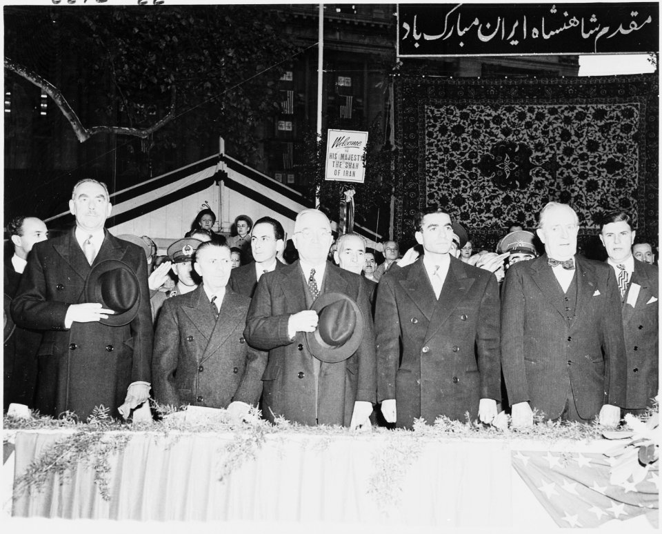 Photograph of President Truman, the Shah of Iran, Secretary of State Dean Acheson, and other dignitaries standing at... - NARA - 200144