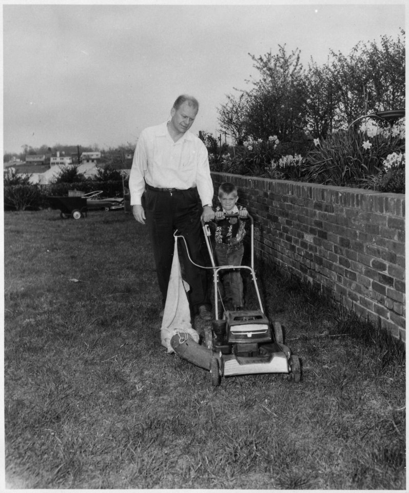 Photograph of Representative Gerald R. Ford and Son Steven Cutting the Lawn at their Alexandria, Virginia Home - NARA - 187003