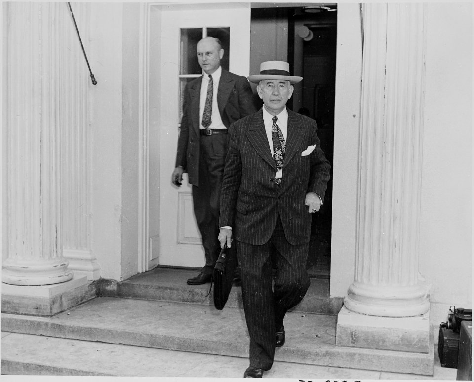 Photograph of Senator Alben Barkley and an unidentified man, leaving the White House on the occasion of the... - NARA - 199158