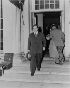 Photograph of Representative Joseph Martin, minority leader of the House of Representatives, leaving the White House... - NARA - 199067 photo