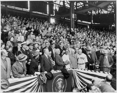 Photograph of President Truman preparing to throw out the first ball at the opening game of the 1951 baseball season... - NARA - 200292 photo